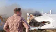 Elon_Musk_overlooking_the_remains_of_F9R_(36411051713) (1).webp