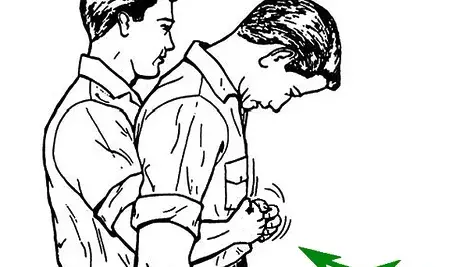 Abdominal_thrusts_against_choking_(cropped).webp