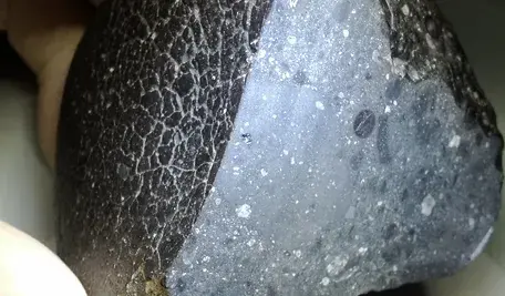 MarsMeteorite-NWA7034-716969main_black_beauty_full.webp