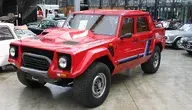 1620px-Lamborghini_LM002_Gen1_Type129_1986-1993_1988_frontleft_2013-03-17_U.webp