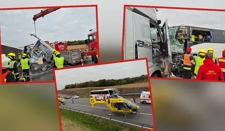 Rozbite pojazdy na miejscu tragicznego wypadku na autostradzie A5 w Austrii – zderzenie polskiego autokaru, ciężarówki i samochodu dostawczego. Strażacy pracują przy wraku, w tle widać służby ratunkowe zabezpieczające teren zdarzenia.