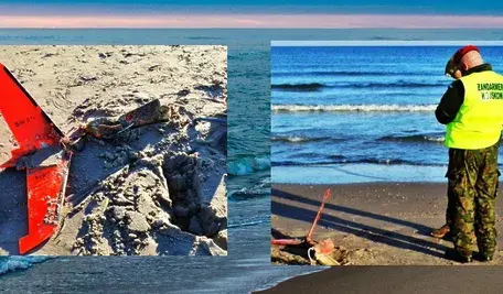 Fragmenty wojskowego imitatora drona znalezione na plaży w Ustce; miejsce zabezpieczone przez Straż Graniczną i Żandarmerię Wojskową.