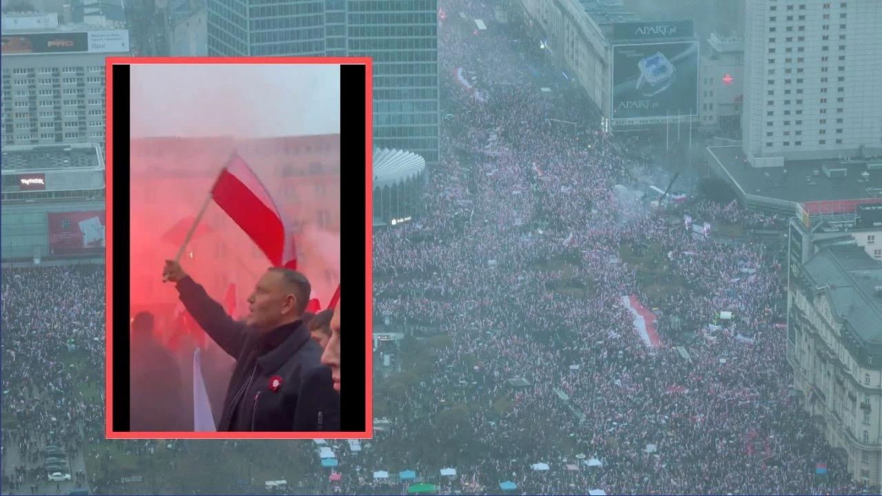 Prezydent Nawrocki z flagą wśród uczestników Marszu Niepodległości