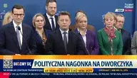 Konferencja prasowa Michała Dworczyka. Obok m. in. premier Mateusz Morawiecki i wicepremier Piotr Gliński oraz posłanka Anna Kwiecien w zielonym kostiumie i czerwonej apaszce