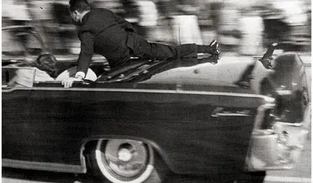 Clint_Hill_on_the_limousine.webp