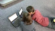 laptop-computer-girl-play-floor-boy-1246667-pxhere.com.webp