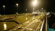 panama-canal-Miraflores-lock-night-boat-ship-travel-commerce-world-waterway-reflection-water-light-metropolitan-area-lighting-street-light-city-even.webp