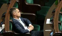 Michał Kołodziejczak na sali sejmowej