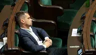 Michał Kołodziejczak na sali sejmowej