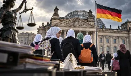 Dziecięce małżeństwa w Niemczech – dziewczynki na tle Reichstagu i niemieckiej flagi symbolizujące problem przymusowych związków małoletnich