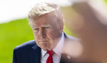President Donald Trump speaks to reporters as he departs the White House for Alaska, in Washington, DC, USA, 13 October 2026. President Trump is traveling to Alaska to campaign for incumbent Republican Senator Dan S. Sullivan, who is running for re-election in Novembe