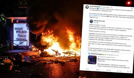 Nocny protest pod płonącą barykadą