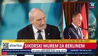 Antoni Macierewicz i Donald Tusk w tle sprawa SAFE i niemiecka flaga 