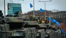 Niemcy znowu chcą być militarną potęgą. Niemieckie czołgi jadą ulicą.