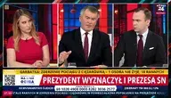 Debata w studiu wPolsce24 z udziałem ekspertów na temat powołania sędziego Zbigniewa Kapińskiego na I prezesa Sądu Najwyższego. W centrum kadru znajduje się Zbigniew Kapiński, po lewej prowadząca, po prawej komentator. Na pasku informacyjnym napis: ‘Prezydent wyznaczył I prezesa SN