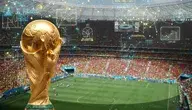 Złoty puchar na tle stadionu piłkarskiego