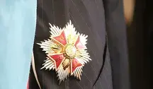 Order Orła Białego przypięty na marynarce