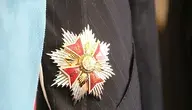 Order Orła Białego przypięty na marynarce