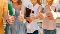 group-happy-students-showing-thumbs-up-close-up.webp