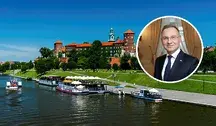 Zdjęcie Andrzeja Dudy, w tle zamek na Wawelu