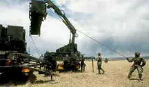 1280px-Soldiers_from_the_31st_Air_Defense_Artillery_Brigade_at_work