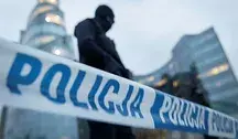 Policjant zabezpieczający miejsce zdarzenia