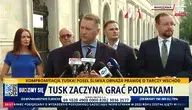 Przemysław Czarnek podczas konferencji prasowej obok niego w niebieskiej sukience Edyta MARCHELSKA-GROSZFELD