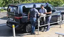 nwestor giełdowy Rafał Zaorski (C) doprowadzany do delegatury Prokuratury Krajowej w Katowicach