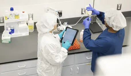 gsk-operators-calibrating-ph-meter